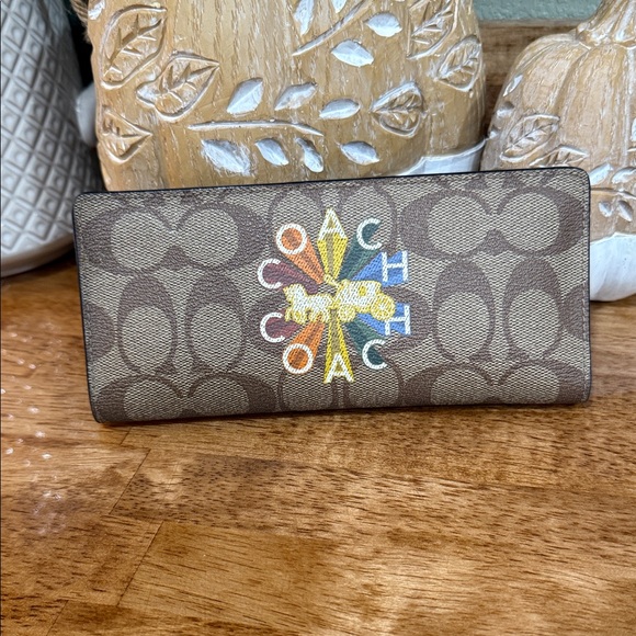 Coach Handbags - Coach Brown Wallet with Multicolor Logo